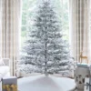 Rushmore flock artificial Christmas tree assembled and as seen in Home