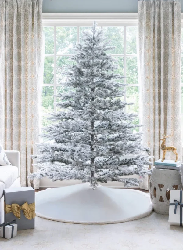 Rushmore flock artificial Christmas tree assembled and as seen in Home