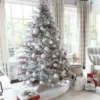 beautifully decorated Rushmore Artificial Christmas tree in a home