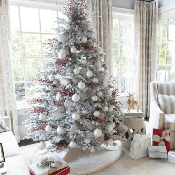 beautifully decorated Rushmore Artificial Christmas tree in a home