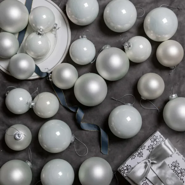 24PackWhiteEssential a view of White Essential Glass Ornaments (24 Pack) available at Christmas Jungle
