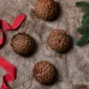 A view of 4 pack pine cone available at Christmas Jungle