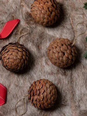 A view of 4 pack pine cone available at Christmas Jungle