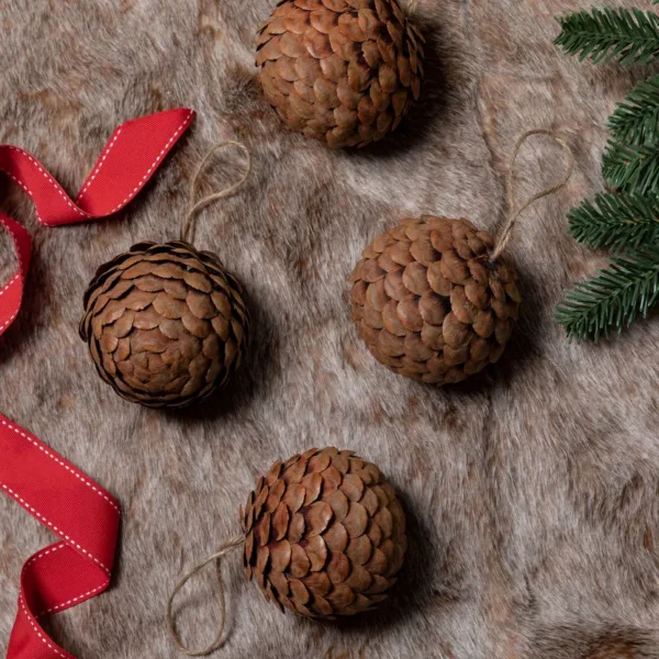 A view of 4 pack pine cone available at Christmas Jungle