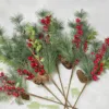 BerryandPinePicks_12Pack A bundle of Berry and Pine Picks featuring red berries, pine needles, leafy greenery, and pinecones.