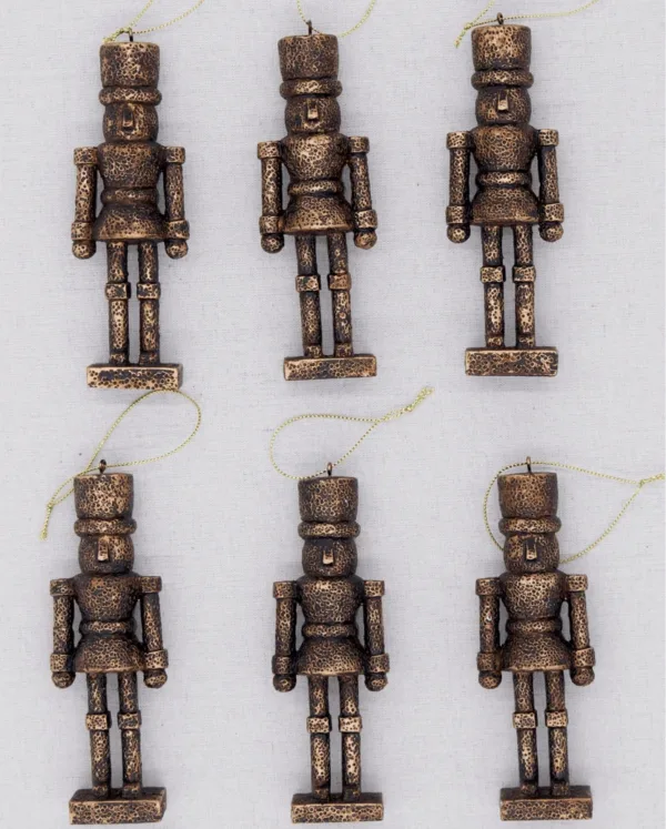 BronzeNutcrackerGlassOrnamentSet_6Pack Christmas Jungle Set of six bronze nutcracker glass Christmas ornaments with gold hanging loops.