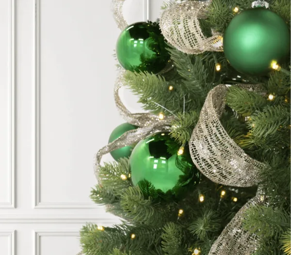 zoomed view of Green Essential Glass Ornaments on Artificial Christmas tree