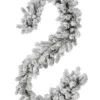 King Flock Garland arranged in a vertical S-curve showing dense snow-flocked pine branches against a white background.