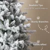 Close-up of snow-flocked Queen Flock Full Artificial Christmas Tree branches highlighting realistic PVC and PE tips.