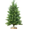 3' Royal Fir Artificial Christmas Tabletop Tree with lush green foliage mounted on a realistic faux wood log base against a plain white background.