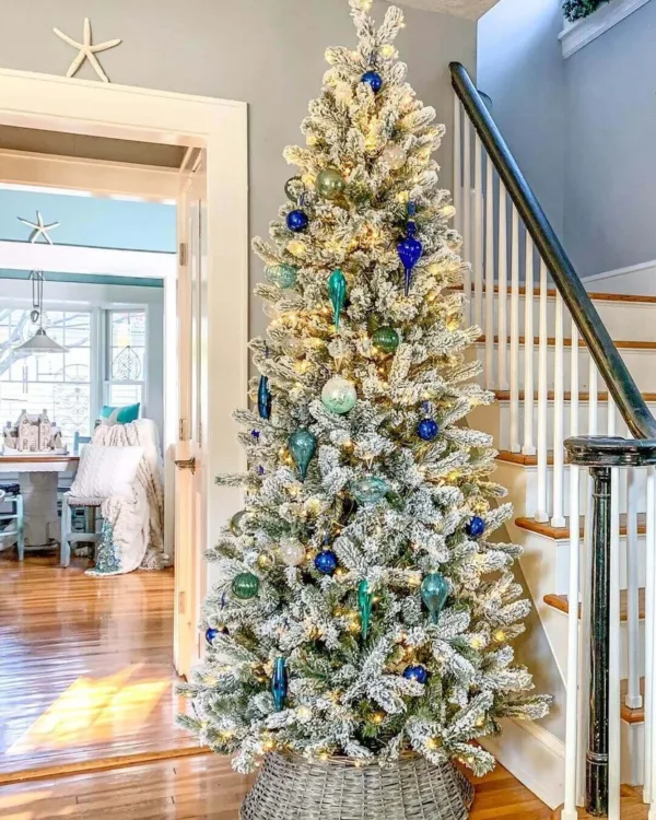 Snow Flake ornament on a Lit artificial Christmas tree