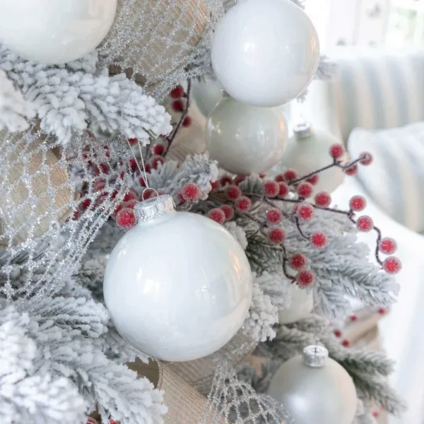 White24Essentials2 beautifully Styled Flock Artificial Christmas tree with White Essential Glass Ornaments