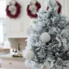White diamond hanged on flock artificial Christmas tree