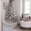 View of Winter Frost 15-Piece Glass Ornament Set (White-Silver) hanged on a Flock Artificial Christmas tree