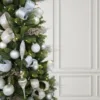 Winter Frost 15-Piece Glass Ornament Set (White-Silver) hanged on fir Artificial Christmas Tree