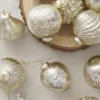 a view of Gold Accents Glass Ornament available at Christmas jungle