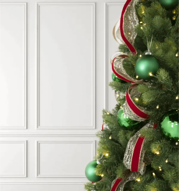 Gold Mesh Ribbon paired with red velvet ribbon layered on a Christmas tree next to green baubles.